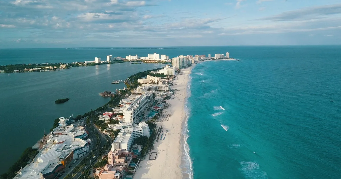 Turquoise Mexico resort coastline and excursion catamaran